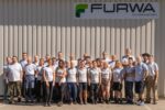 Das Team der Furwa Furnierkanten GmbH vor dem Firmensitz im bayerischen Walkertshofen. Foto: Furwa Furnierkanten GmbH.